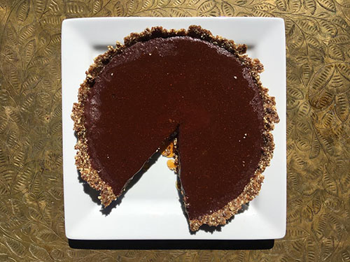 Robust Raw Cacao Pie with Nut and Fruit Crust